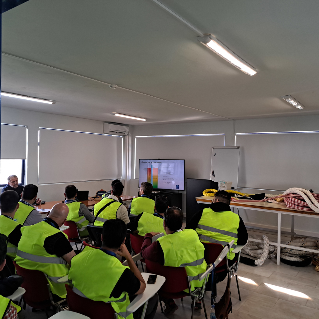 Maritime training session on synthetic mooring ropes at Katradis Marine Ropes Industry S.A., focusing on technical concepts, rope handling, and certification procedures.